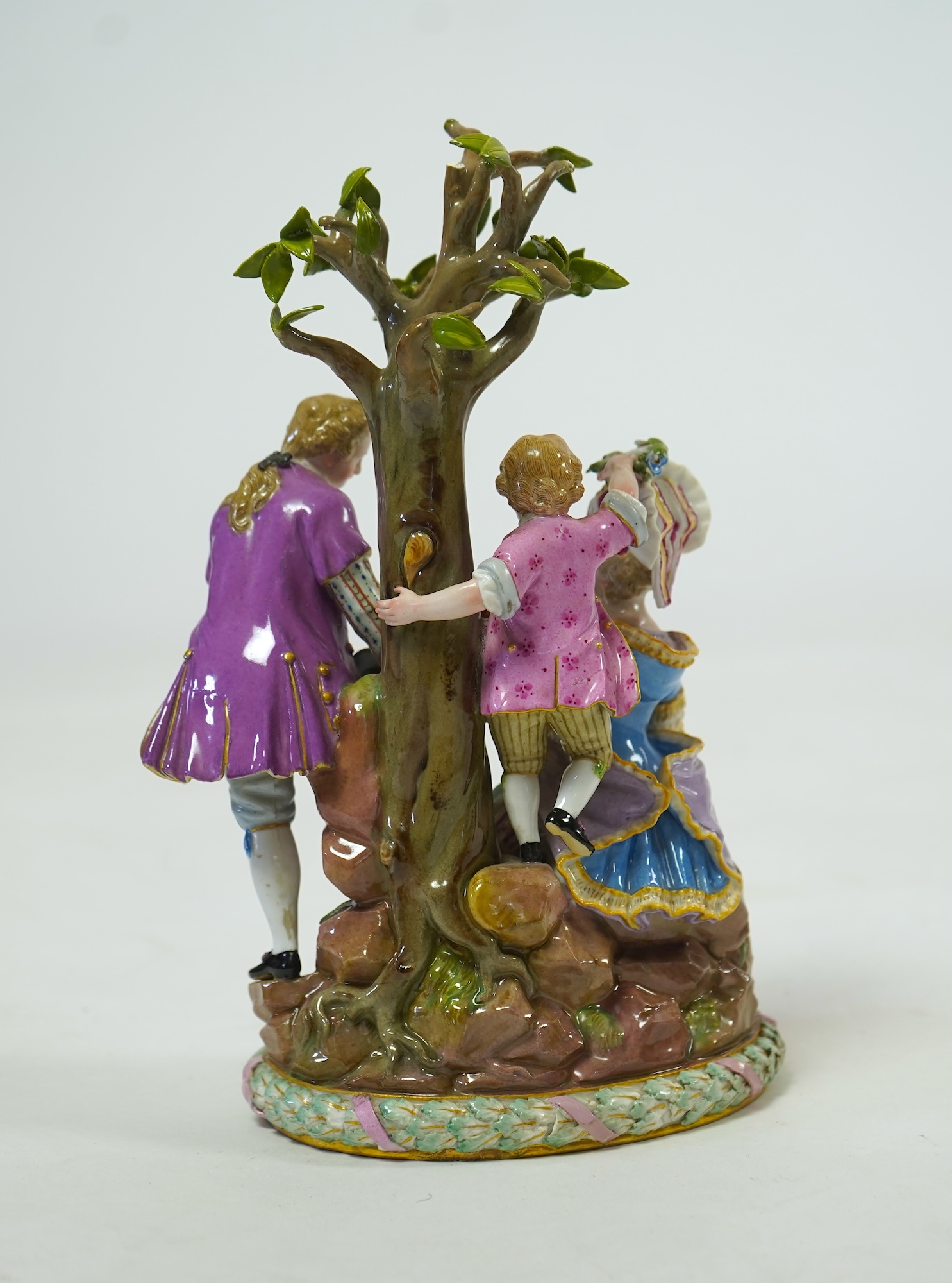 A Meissen porcelain figure group of 'Gardeners' at the Apple Tree', late 19th century